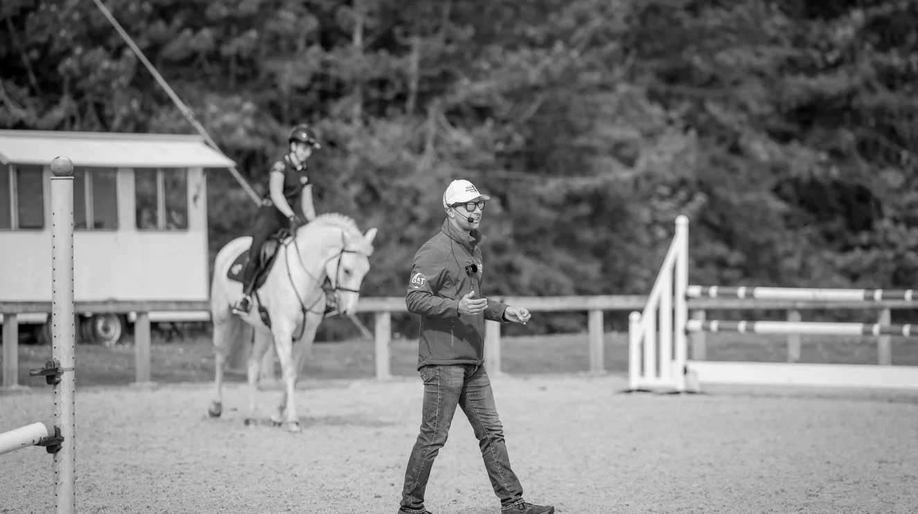 Dan Bizzarro coaching at a clinic arena